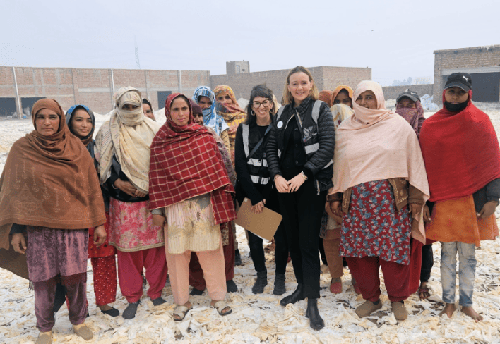 Closed Loop Fashion team Marina Chahboune & Arianna Nicoletti with women workers in Satiana Waste Cluster, Faisalabad, Punjab, Pakistan
